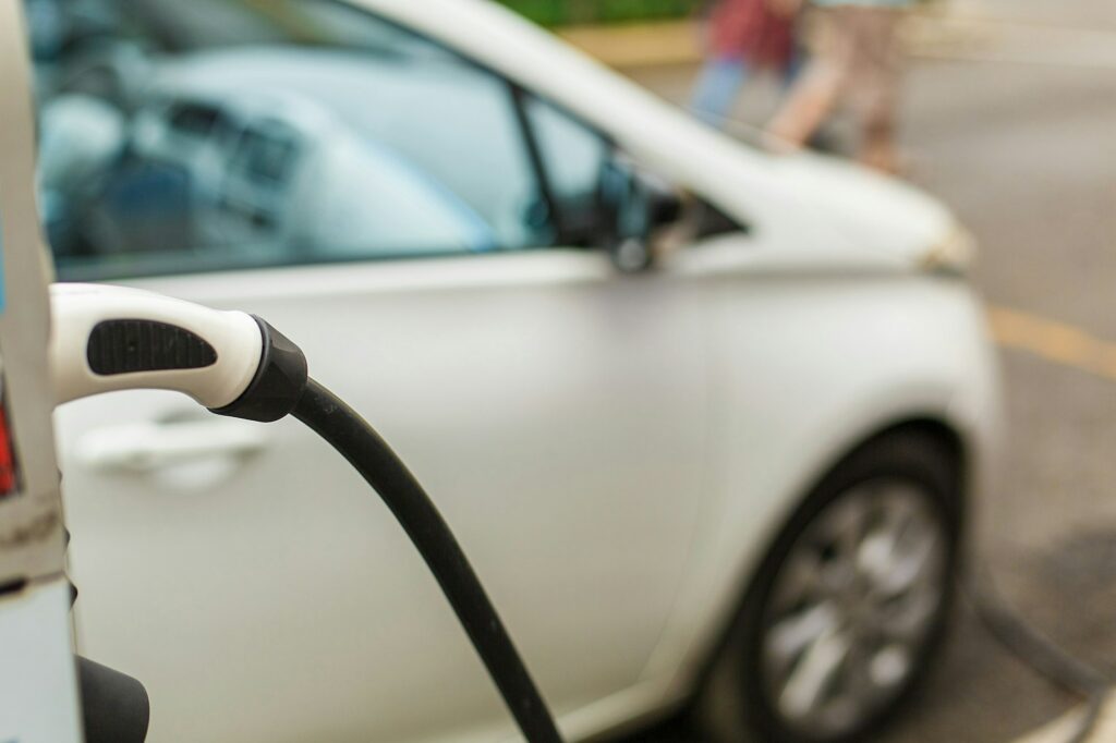 Electric Car in Charging Station. Charging An Electric Car, Future Of Transportation